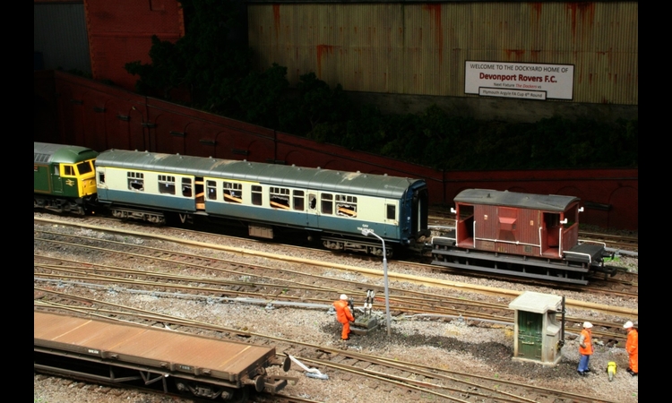 Withdrawn ex MOD special instruction coach off for scrap.